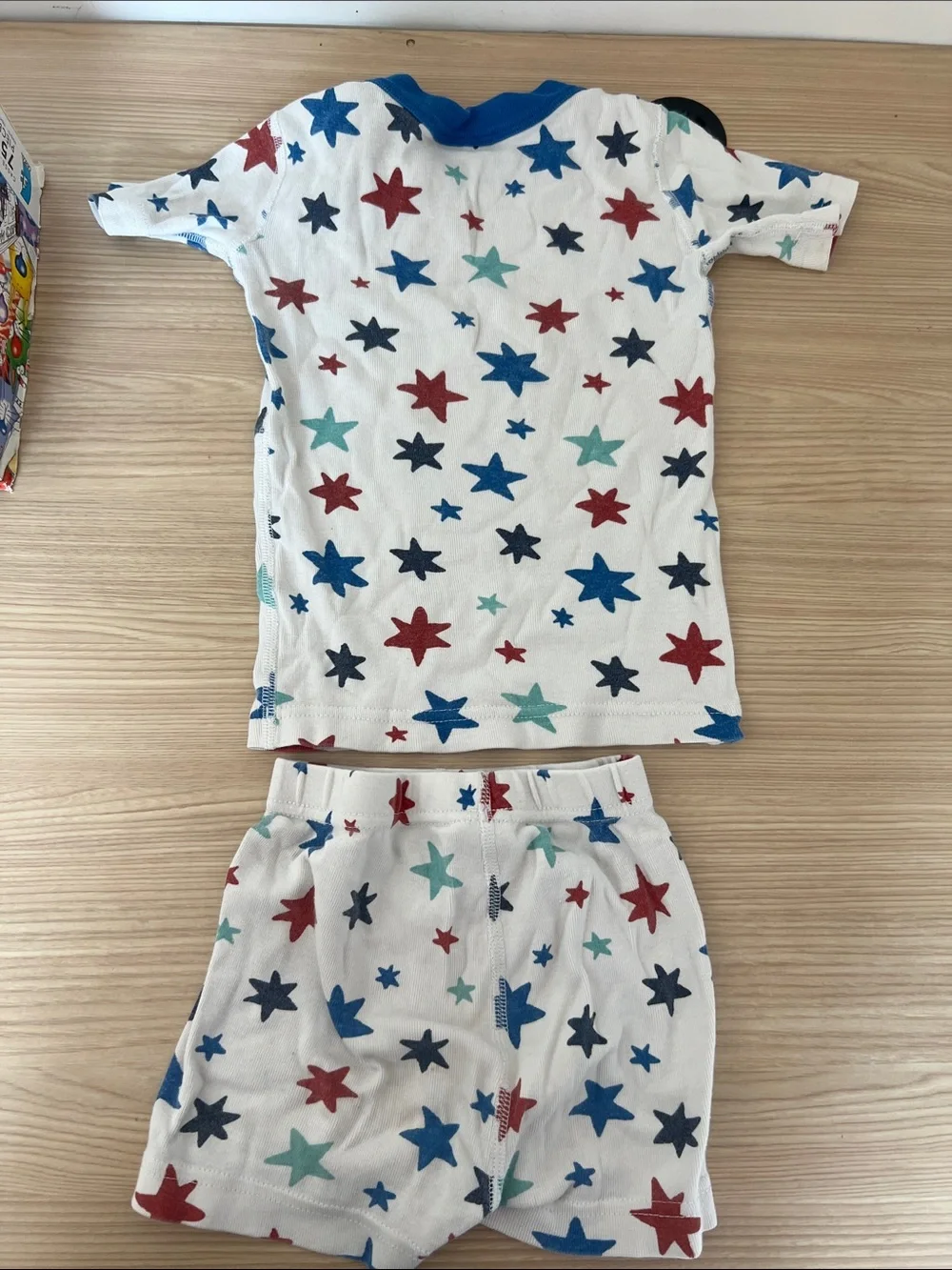 Hanna Andersson White Pajama Set with Blue, Red & Teal Stars